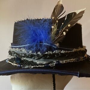 Stylish Black Hat with Blue Feather Details